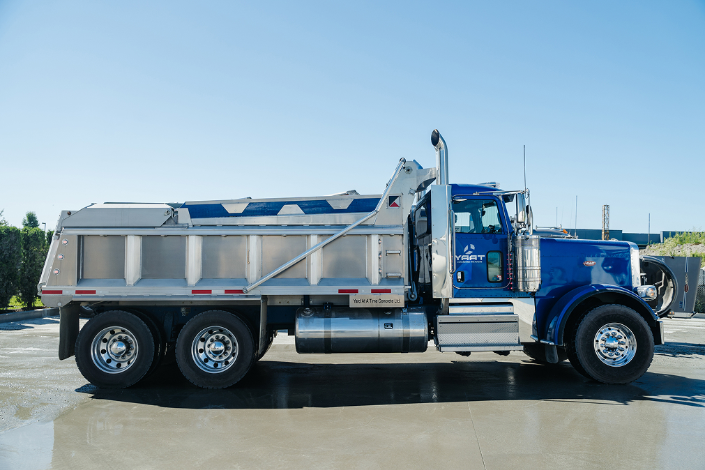 YAAT dump truck hauling gravel and aggregate