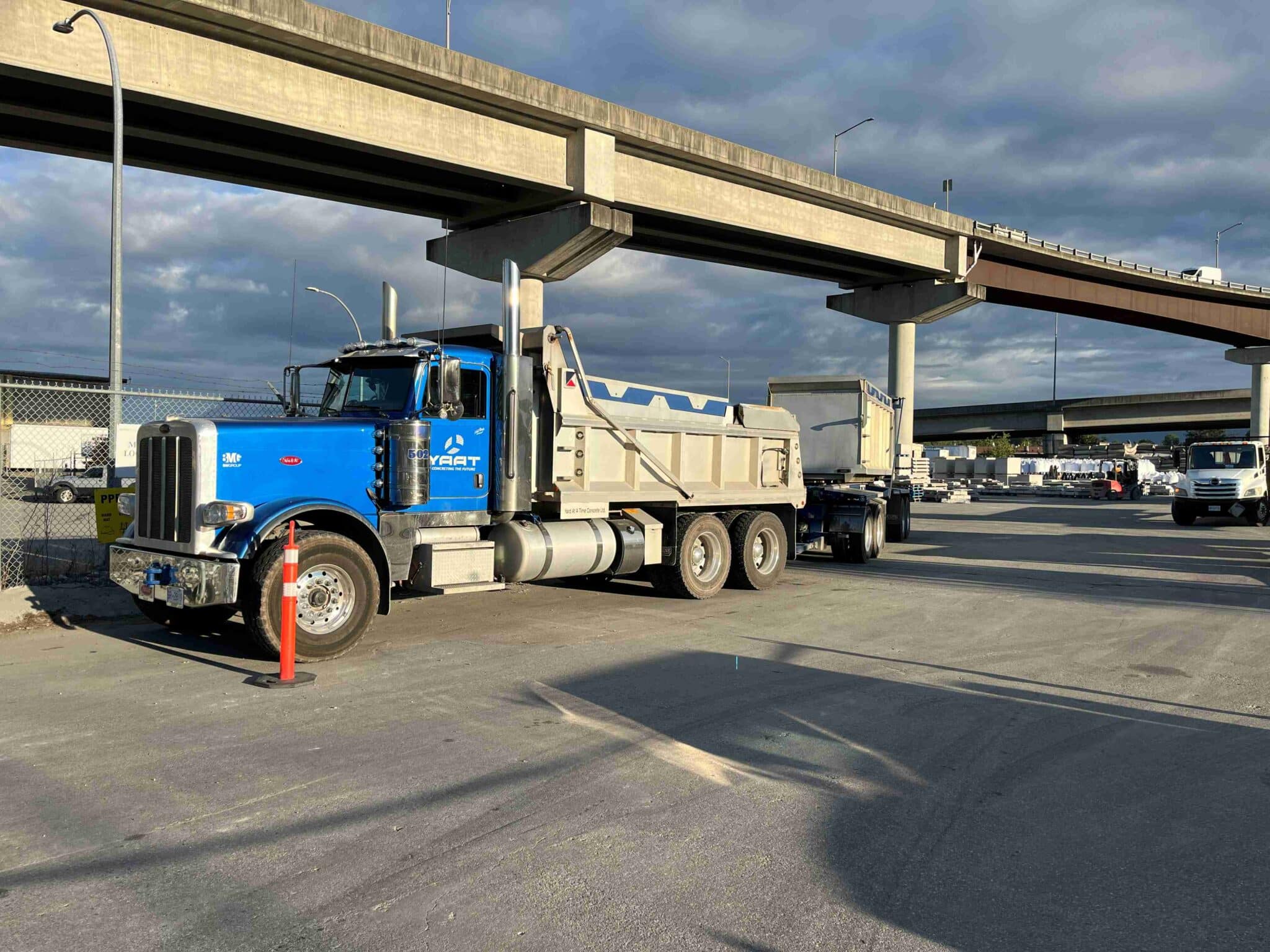 YAAT truck and transfer hauling truck in Metro Vancouver